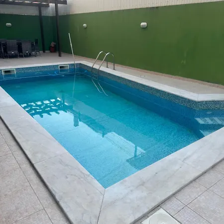 Triple In A House With A Pool