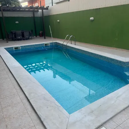 Triple In A House With A Pool *